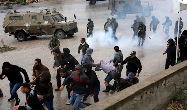 IOF assaulting Palestinians in Nablus