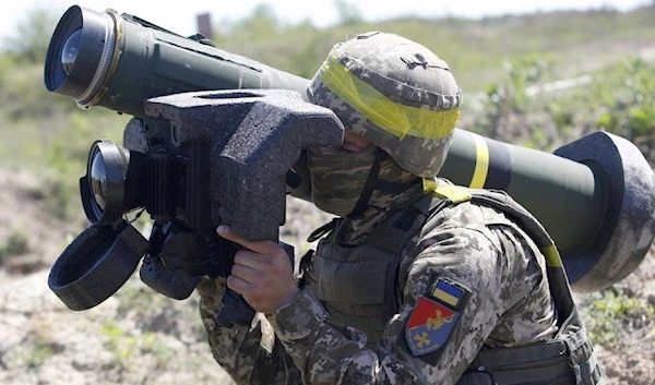 A Ukrainian soldier holding a Javelin anti-tank missile system during exercises in 2021.