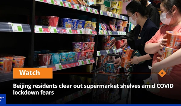 Beijing residents clear out supermarket shelves amid COVID lockdown fears