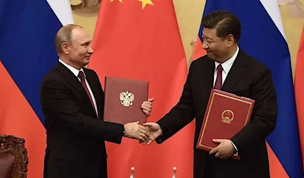 Russia's President Vladimir Putin and his China's President Xi Jinping