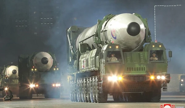 Hwasong-17 ICBM in a nighttime military parade marking the 90th anniversary of the founding of the People's Revolutionary Army