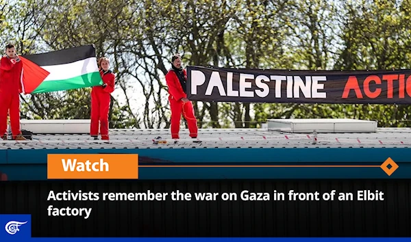 Activists remember the war on Gaza in front of an Elbit factory