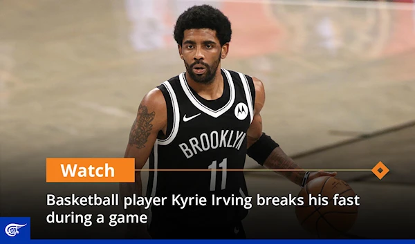 Basketball player Kyrie Irving breaks his fast during a game