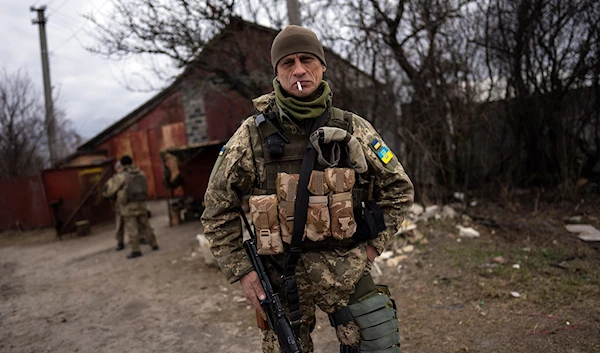 Ukrainian soldiers near the frontline in on the outskirts of Kiev, Ukraine, March 28, 2022 (AP)