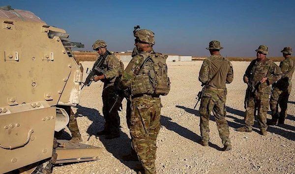 A group of U.S. soldiers board fighting vehicles at a US military base at undisclosed location in Northeastern Syria, Monday, Nov. 11, 2019. (AP)