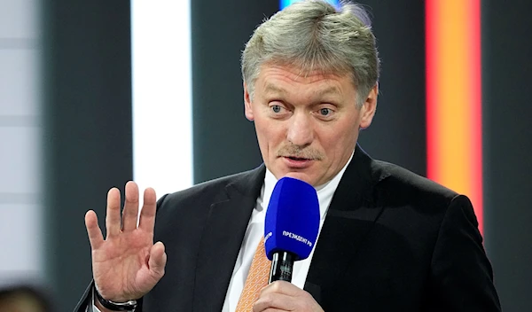 Kremlin spokesman Dmitry Peskov speaks to journalists in Moscow, Russia, December 23, 2021 (AP)