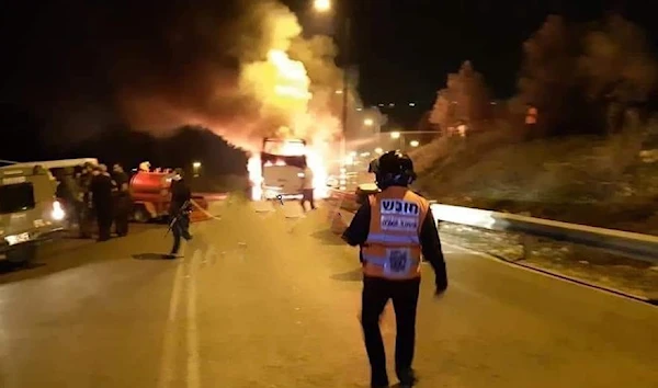 Palestinian youths set an Israeli settlers' bus on fire in Nablus