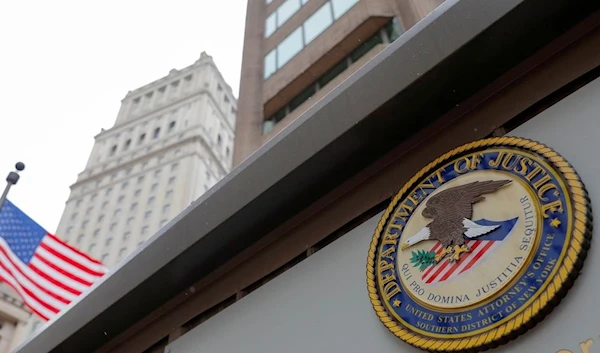 The seal of the US Department of Justice is seen on the building exterior of the United States Attorney's Office of the New York City (Reuters)