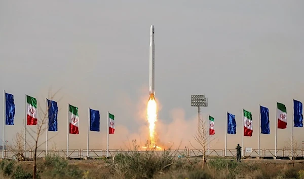 Iran launching satellite into orbit (Fars)