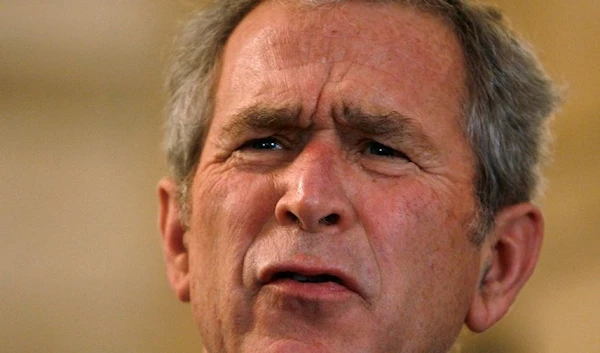 U.S. President George W. Bush reacts to a question after a man threw a shoe at him during a joint statement with Iraqi Prime Minister Nouri al-Maliki in Baghdad, Iraq December 14, 2008. (Reuters)