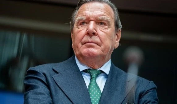 Gerhard Schröder speaking in St Petersburg (AFP)