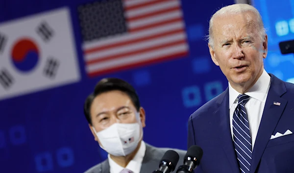 South Korean President Yoon Suk-yeol looks on as US President Joe Biden delivers remarks during a visit in Pyeongtaek, South Korea, May 20, 2022 (Reuters)