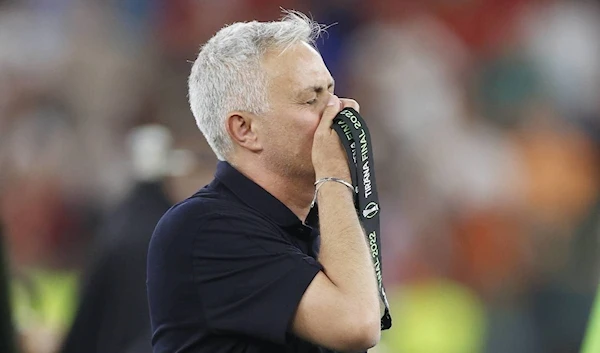 Jose Mourinho pictured kissing his winners medal after leading Roma to glory in the first ever Europa Conference League final