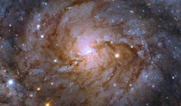 A zoomed-in view of the galaxy IC 342 as seen by the Hubble Telescope released by NASA