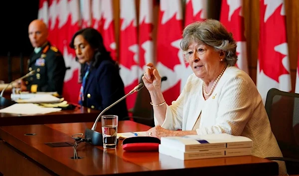 Former Supreme Court justice Louise Arbour, right, and Minister of National Defence, Anita Anand, centre, release the final report of the independent review into sexual misconduct in the military in Ottawa on May 30, 2022. (The Canadian Press)