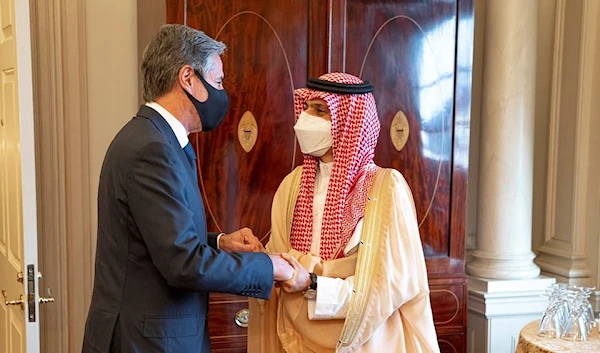 US Secretary of State Antony Blinken and Saudi Foreign Minister Prince Faisal Bin Farhan Al Saud arrive to speak to reporters at the State Department in Washington, October 14, 2021. (AP)