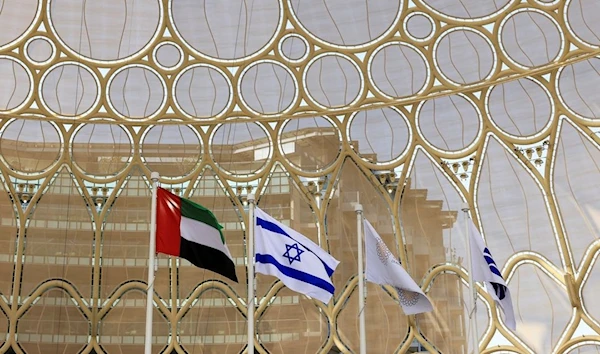 Flags of United Arab Emirates, “Israel” and Expo 2020 Dubai flutter at Expo 2020 Dubai (REUTERS)