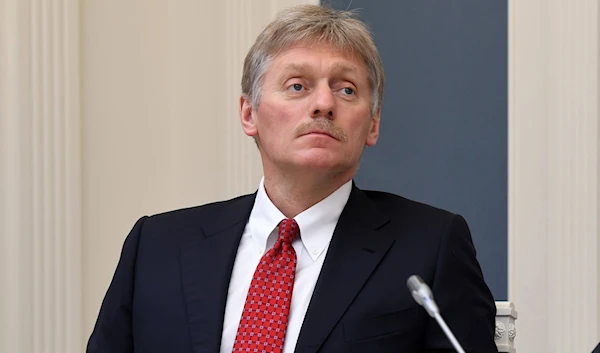 Kremlin spokesperson Dmitry Peskov attends a video conference with Russian President Vladimir Putin in the Kremlin in Moscow, Russia, April 14, 2020 (AP)