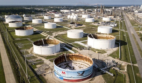 Crude oil storage tanks at a refinery in Texas City, Texas, in April 2020 (New York Times)