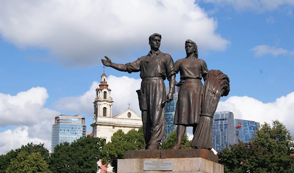 A Soviet-era statue of farmers on the Green Bridge, Vilnius, Lithuania (Photo credit: Ray Tang)