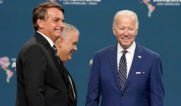 US President Joe Biden speaks with Brazil's President Jair Bolsonaro and Colombia's President Ivan Duque during the Ninth Summit of the Americas in Los Angeles, California, US on June 10, 2022 (Reuters)