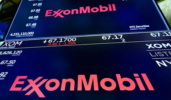 The logo for ExxonMobil appears above a trading post at the New York Stock Exchange in 2019.(AP)