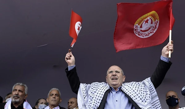 The Secretary-General of the Tunisian Labor Union on the anniversary of the assassination of the Tunisian Prime Minister on December 4, 2021 (AFP)