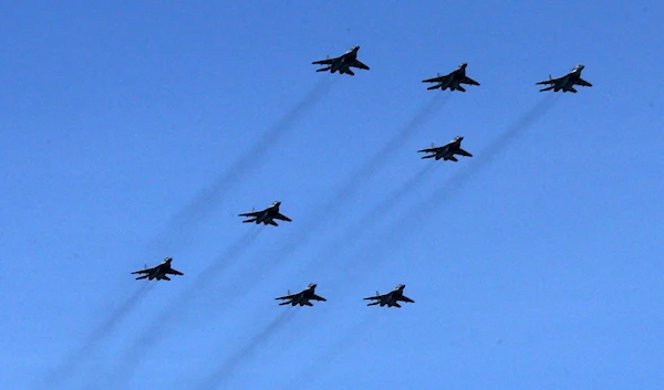 Russian aircraft flying in a "Z" formation outside of Moscow, Russia, May 9, 2022 (Getty)