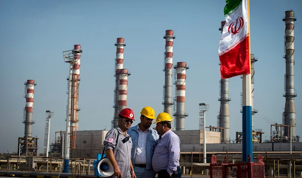 Employees at a facility at the Persian Gulf Star Co. gas refinery in Bandar Abbas, Iran (Bloomberg)