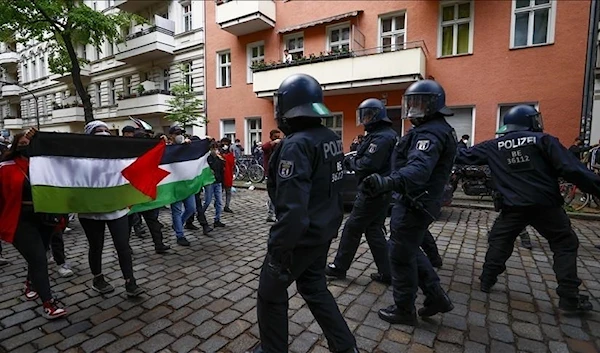 Police officers intervene in demonstrators as people gather to stage a demonstration in support of Palestinians and to protest against Israeli attacks on Gaza Strip, on May 15, 2021, in Berlin, Germany (Anadolu Agency)