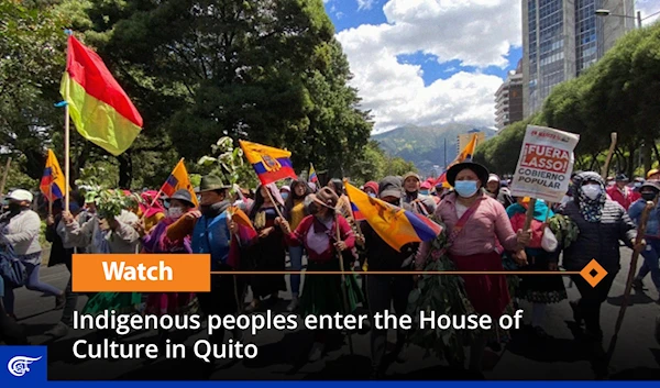 Indigenous peoples enter the House of Culture in Quito