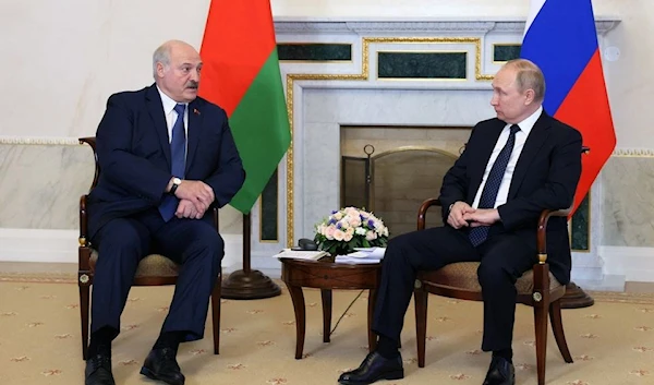 Russian President Vladimir Putin attends a meeting with his Belarusian counterpart Alexander Lukashenko in Saint Petersburg, Russia June 25, 2022 (Sputnik)