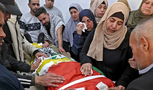 The funeral of Qusai Hamamrah takes place in the occupied West Bank village of Husan on April 14, 2022