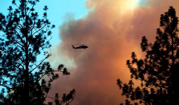 Northern California wildfire threatens 500 buildings.