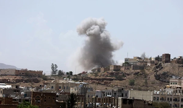 Smokes rise from the site of a Saudi-led coalition air strike in Sanaa, March 30, 2020 (Reuters)