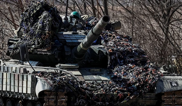 A Ukrainian tank is seen at the front line of the eastern Kiev region in Ukraine, March 20, 2022. (Reuters)