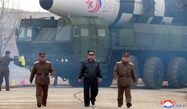 North Korean leader Kim Jong-Un in front of intercontinental ballistic missile