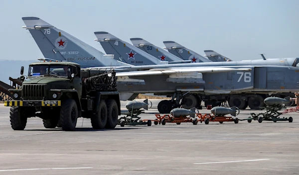 Russian military jets are seen at Hmeymim air base in Syria (Reuters)