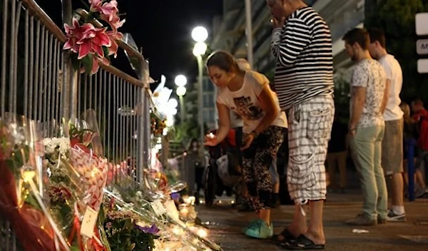 Vigil at the Promenade des Anglais as people mourn in Nice, France, on July 16, 2016, after a terror attack killed 86 people (UPI)