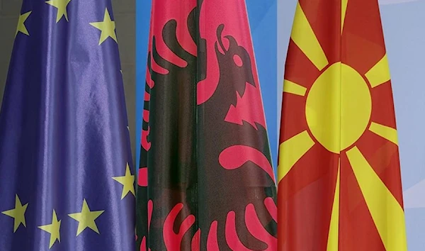 The EU, Albanian, and North Macedonian flags.