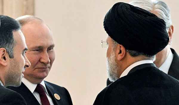 Russian President Vladimir Putin and Iranian President Ebrahim Raisi in Ashgabat, Turkmenistan, June 29, 2022 (Sputnik)