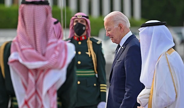 US President Joe Biden arrives at the King Abdulaziz International Airport in Jeddah, Saudi Arabia, July 15 (AFP)