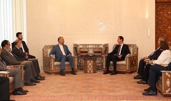 Syrian President Bashar al-Assad during his meeting with Iranian Foreign Minister Hossein Amir-Abdollahian