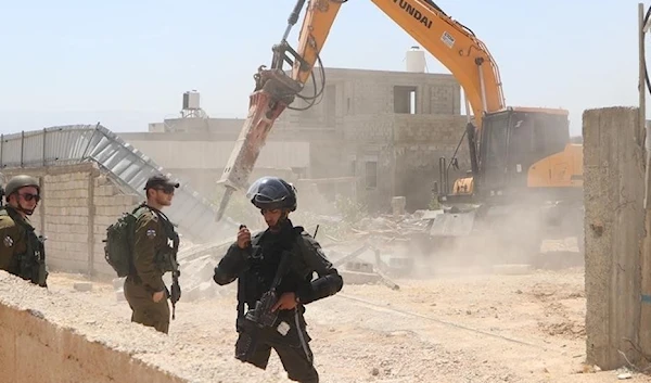 Israeli bulldozers demolish homes of "Ariel" operation doers