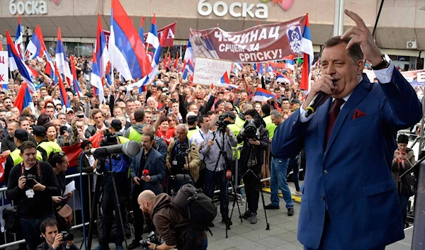 Milorad Dodik, who won the presidency of Republika Srpska on October 7, at a 2016 rally supporting a national holiday that would discriminate against non-Serbs (AP)