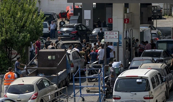 Drivers wait in a long line to get fuel at a gas station in Beirut, Lebanon, Saturday, August 28, 2021. © Hassan Ammar, AP