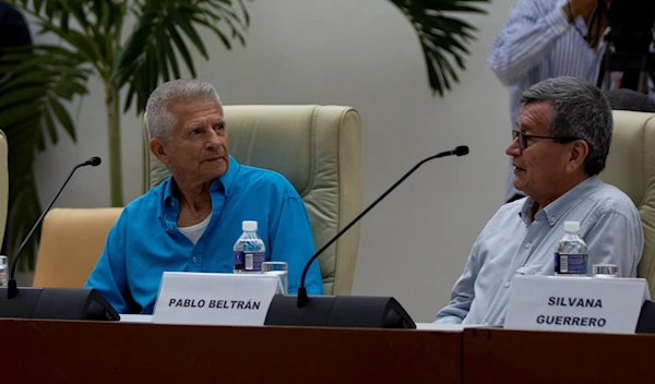 ELN Commanders Victor Orlando Cubides, alias Aureliano Carbonell, left, and Pablo Beltran attend a meeting with Colombian government representatives in Havana, Cuba, Friday, Aug. 12, 2022 (AP Photo/Ismael Francisco)