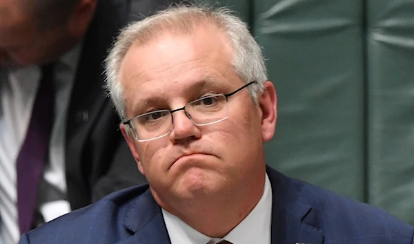 Scott Morrison during Question Time in the House of Representatives on Oct 8: his government's record has been anything but patient or consistent. (Getty Images)