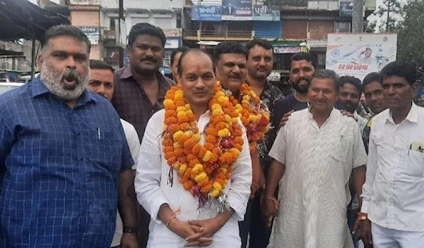 BJP delegate warmly welcoming the convicts who gang-raped Bilkis Bano and brutally murdered 14 members of her family, including a 3-year-old baby.