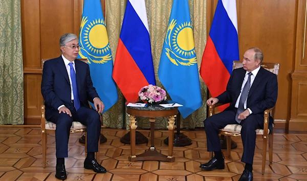 Russian President Vladimir Putin, right, meets with Kazakh President Kassym-Jomart Tokayev in the Black Sea resort of Sochi, Russia, Friday, Aug. 19, 2022 (Press service of the President of Kazakhstan via AP)